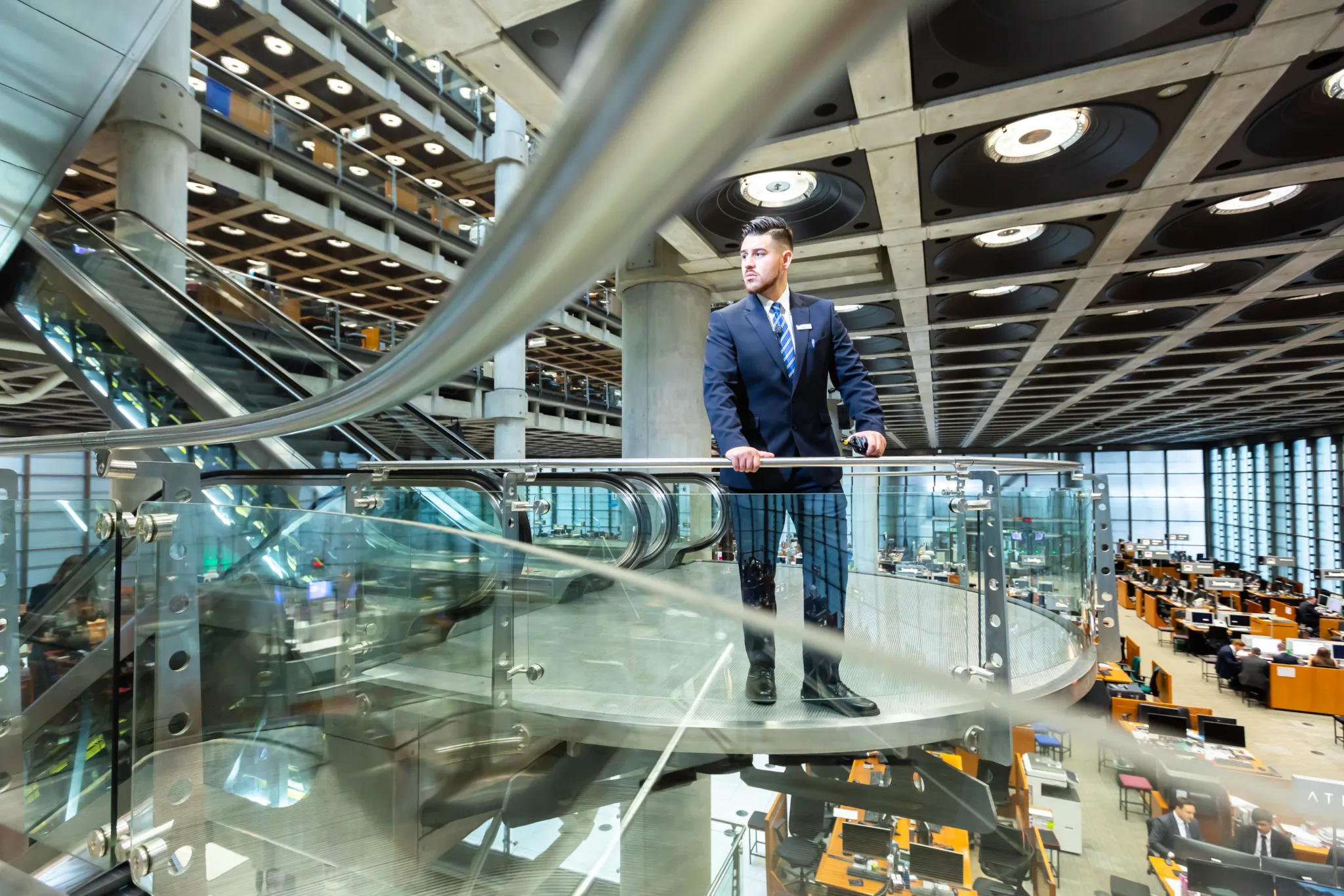 Security guard monitoring a busy commercial property